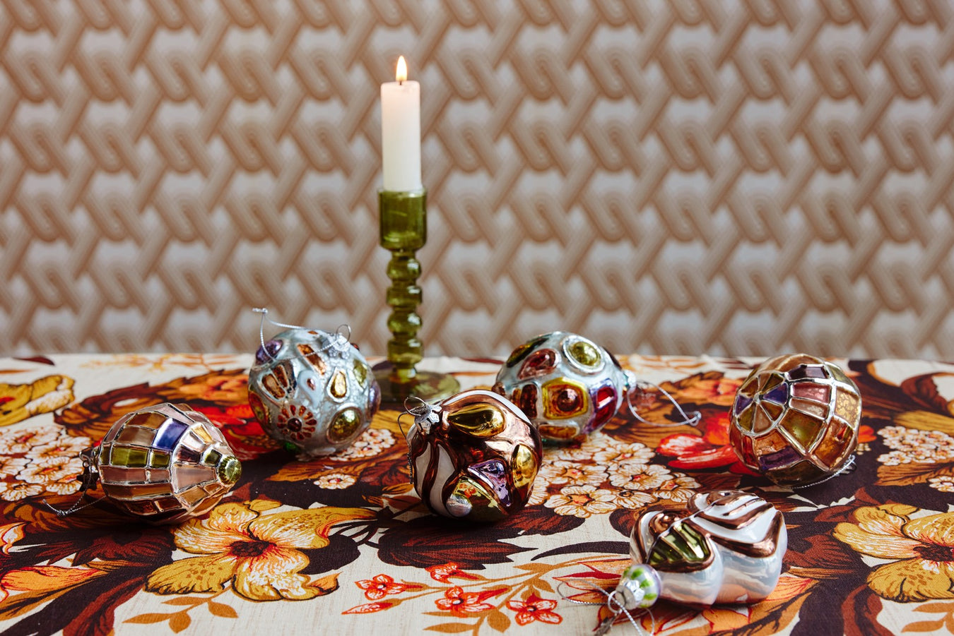 table with vintage style table cloth and Christmas ornaments