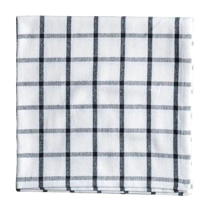 Plaid fabric with black and white pattern on a white background