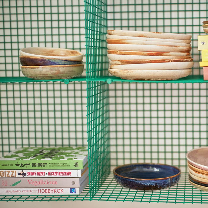 chef ceramics multi color in green open shelving