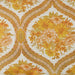 detail of retro style pillow with yellow flower print