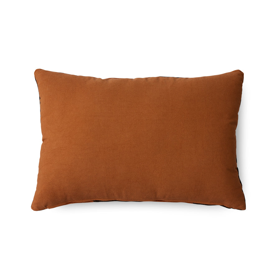 backside ofdark brown and orange striped velvet lumbar pillow