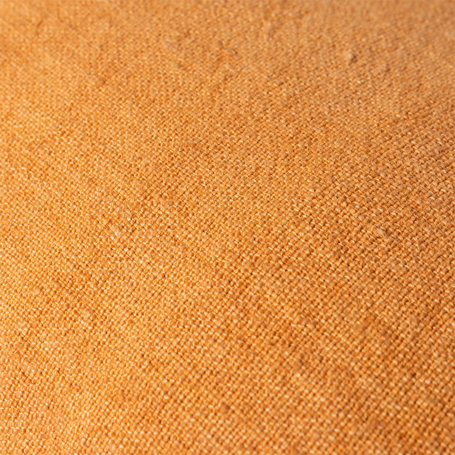 close up of orange color linen fabric
