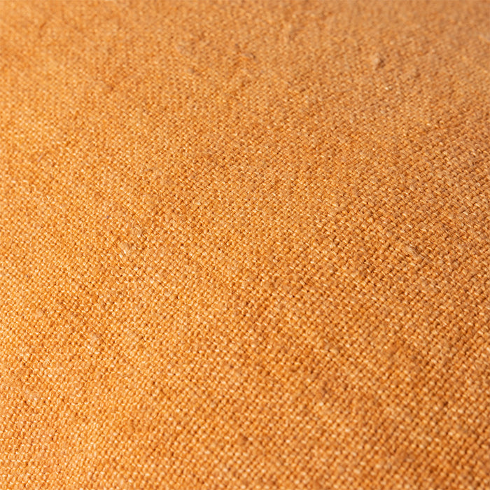 close up of orange color linen fabric