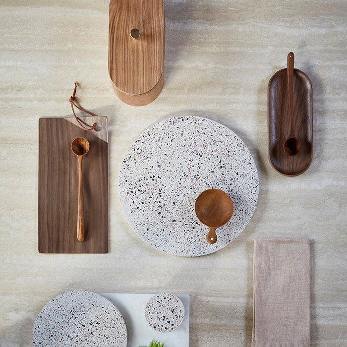 round large terrazzo tray among other beautiful kitchen dispaly goodies