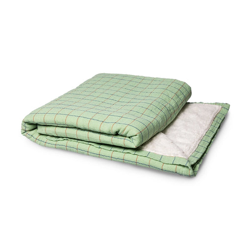 folded green checkered sherpa throw blanket