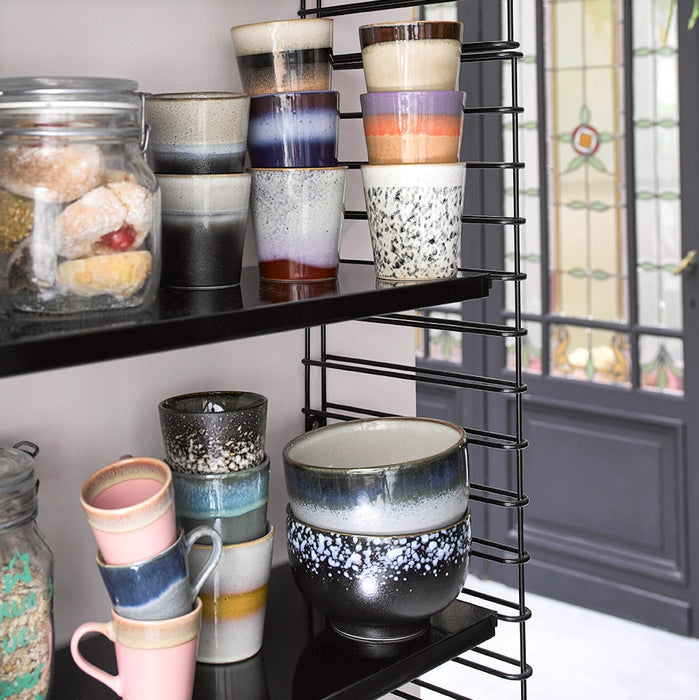 open shelving with 70 style ceramics in multi colors