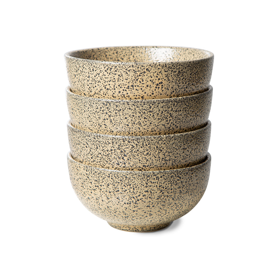 4 stoneware bowls in peach color with dark speckles