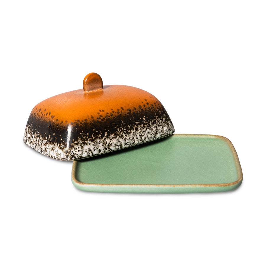 retro style stoneware butterdish in orange brown and green