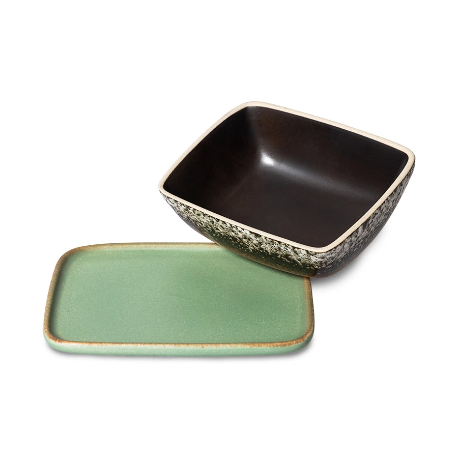 retro style stoneware butterdish in orange brown and green