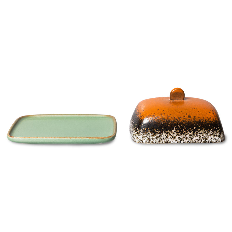 retro style stoneware butterdish in orange brown and green