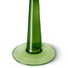 detail of tall stem lime green wine glass