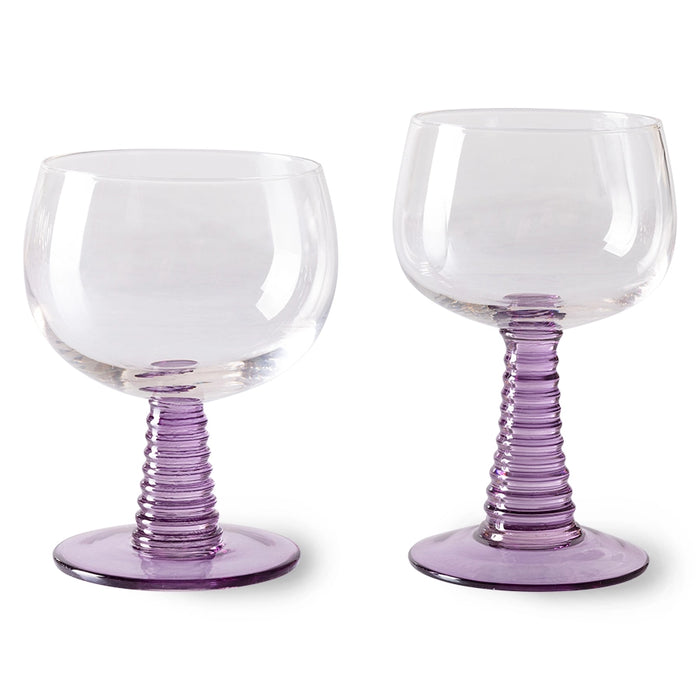 purple colored low and high stem wineglass