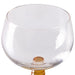 retro style wine glass with ochre colored low stem