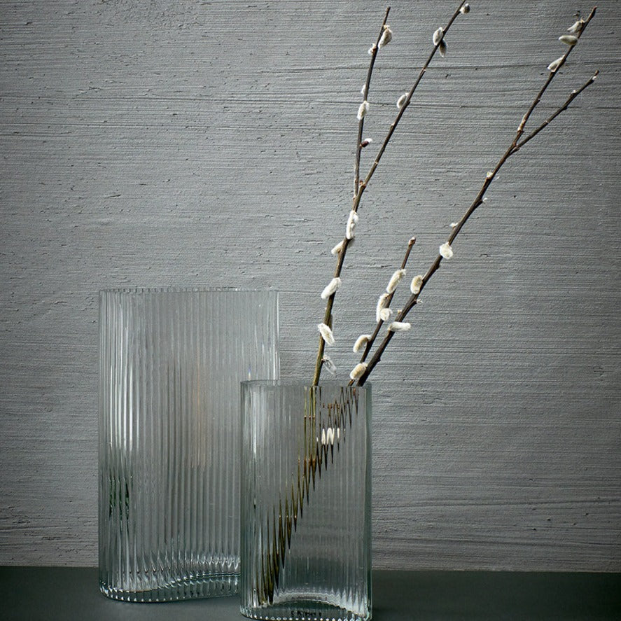 set of two ribbed glass vases with single branch
