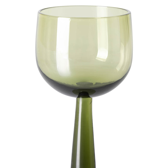 green colored wine glass on tall stem