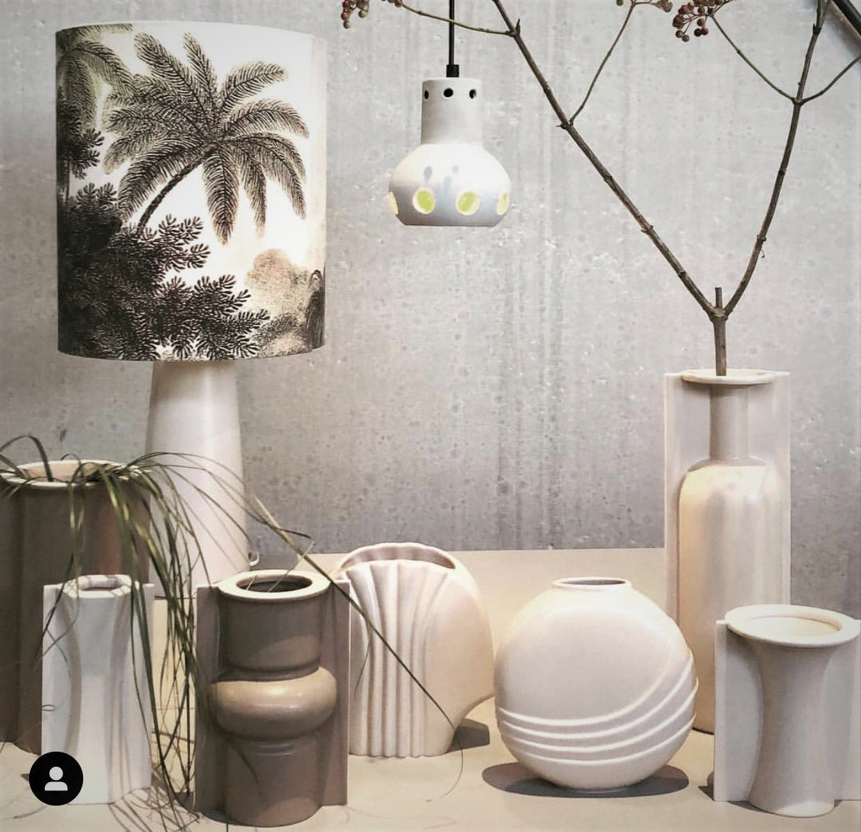 cream colored flower vases and mocha mold shape vase