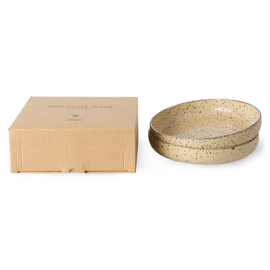 two dep pasta plates in peach color with a gift box