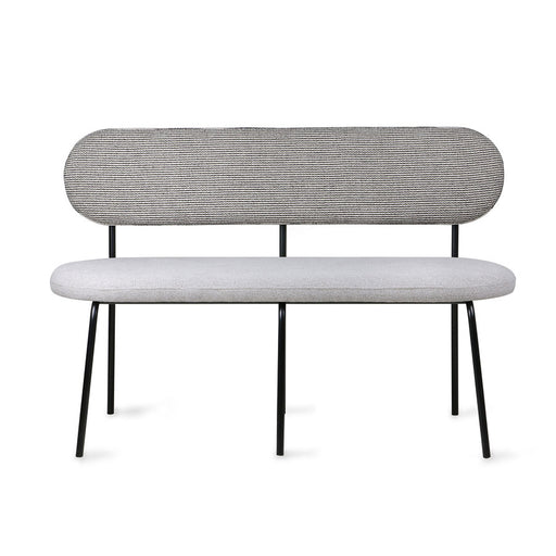bench with metal black legs and a seating with grey fabric and back made from black and white fabric