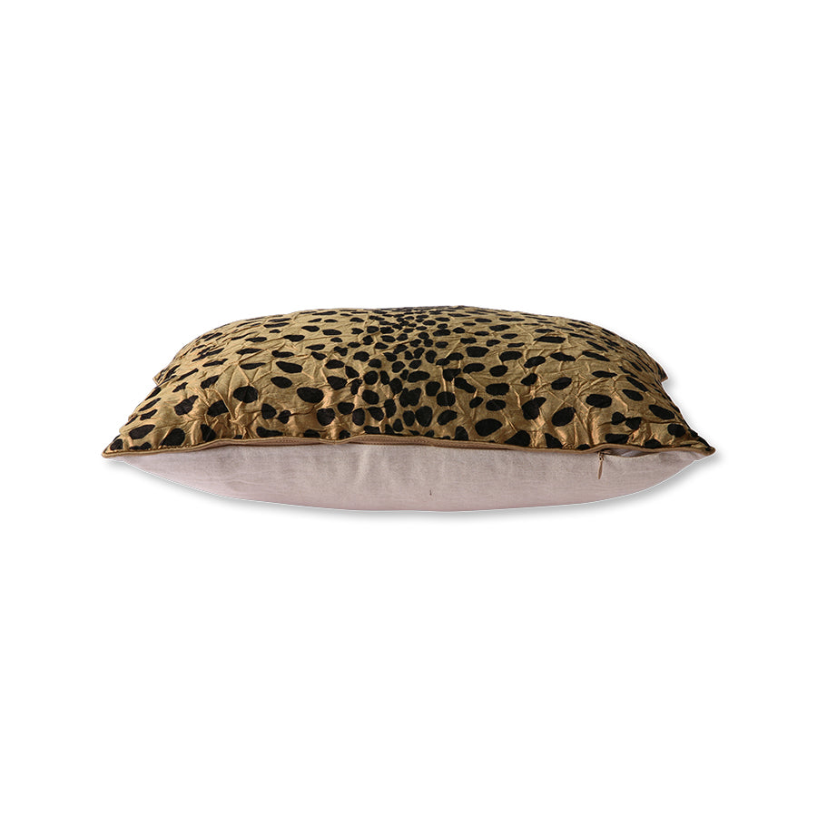 flock panther print on shiny gold backing on one side - plain sand canvas on the other side. Hidden zipper closure.