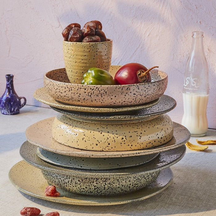 stack of gradient ceramics in earthy colors