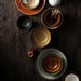 earth toned plates and bowls made in Japan 