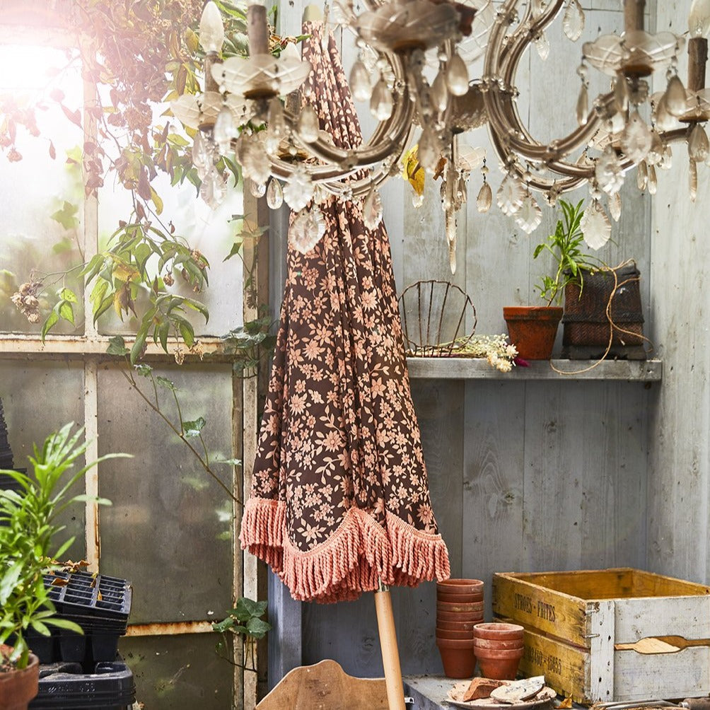 retro style sun umbrella against the wall in a shed