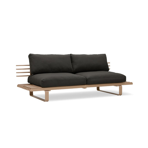 chai colored outdoor sofa with black seating cushions