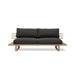 chai colored outdoor sofa with black seating cushions