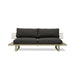 olive colored modern style outdoor sofa with black cushions