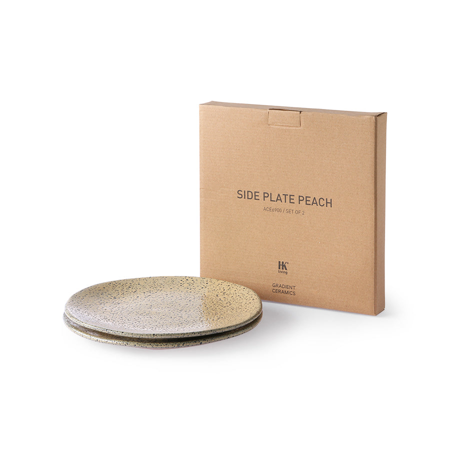 peach colored plates in front of a natural box with side plates on it