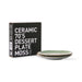 organic shaped green dessert plates with a black gift box