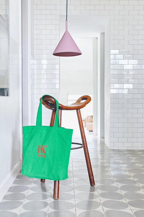 pendant light and barstool with green colored cotton bag