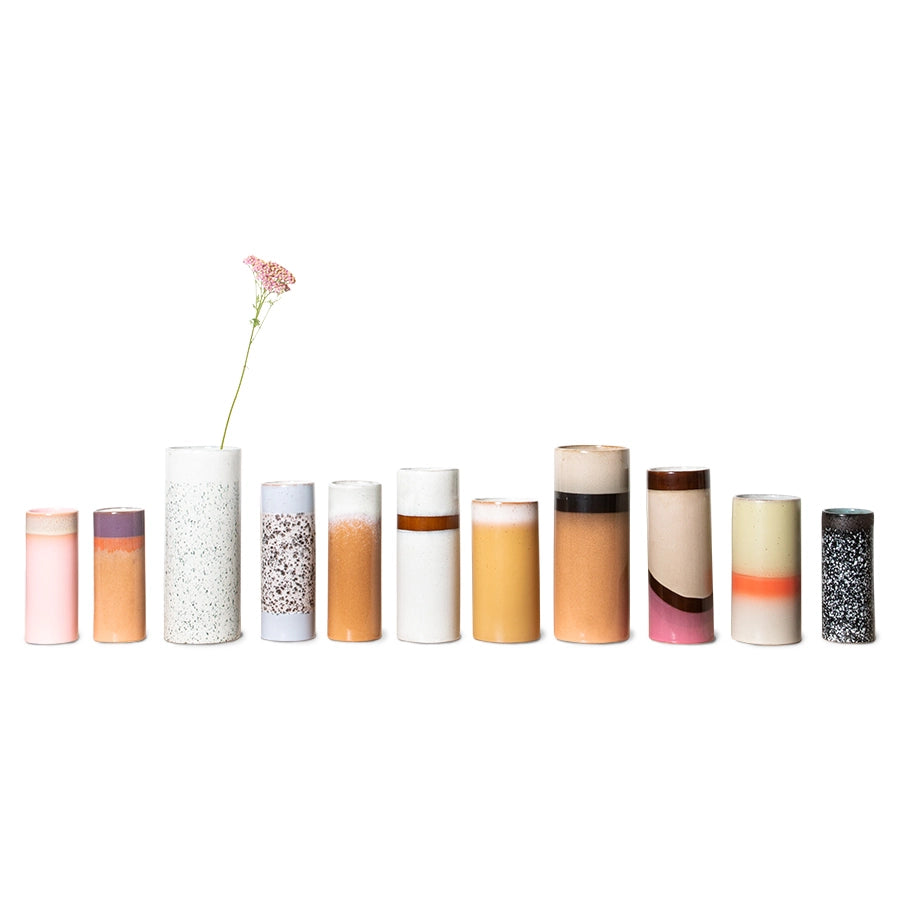 retro style flower vases in a row