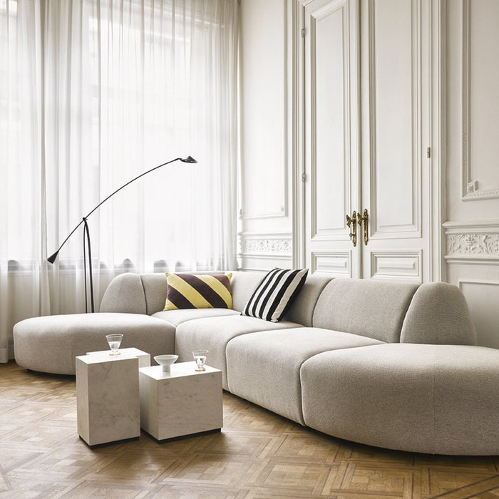 lounge area in modern contemporary style with white marble block side tables