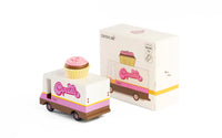 Toy truck with cupcake on top and matching box on a white background