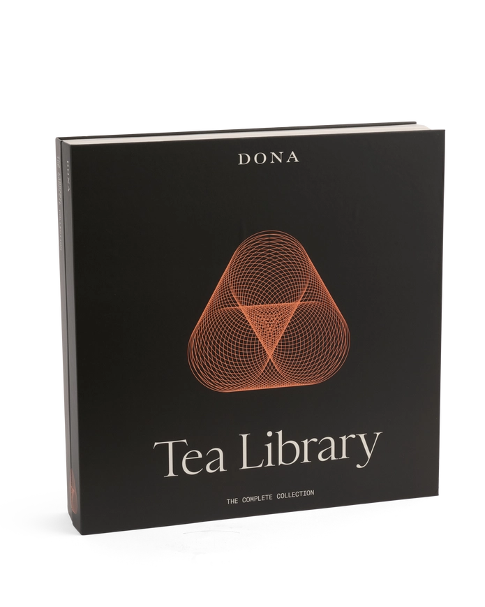 Dona Tea Library book with geometric design on a white background