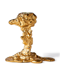 gold colored drip candle stick holder design object