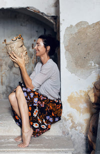 Style icon Marie Olsson Nylander holding a Sicilian Moor head planter