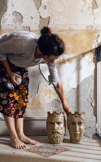 Style icon Marie Olsson Nylander with set of  Sicilian Moor head planter