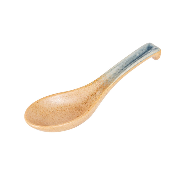 Wooden spoon with a blue handle on a white background