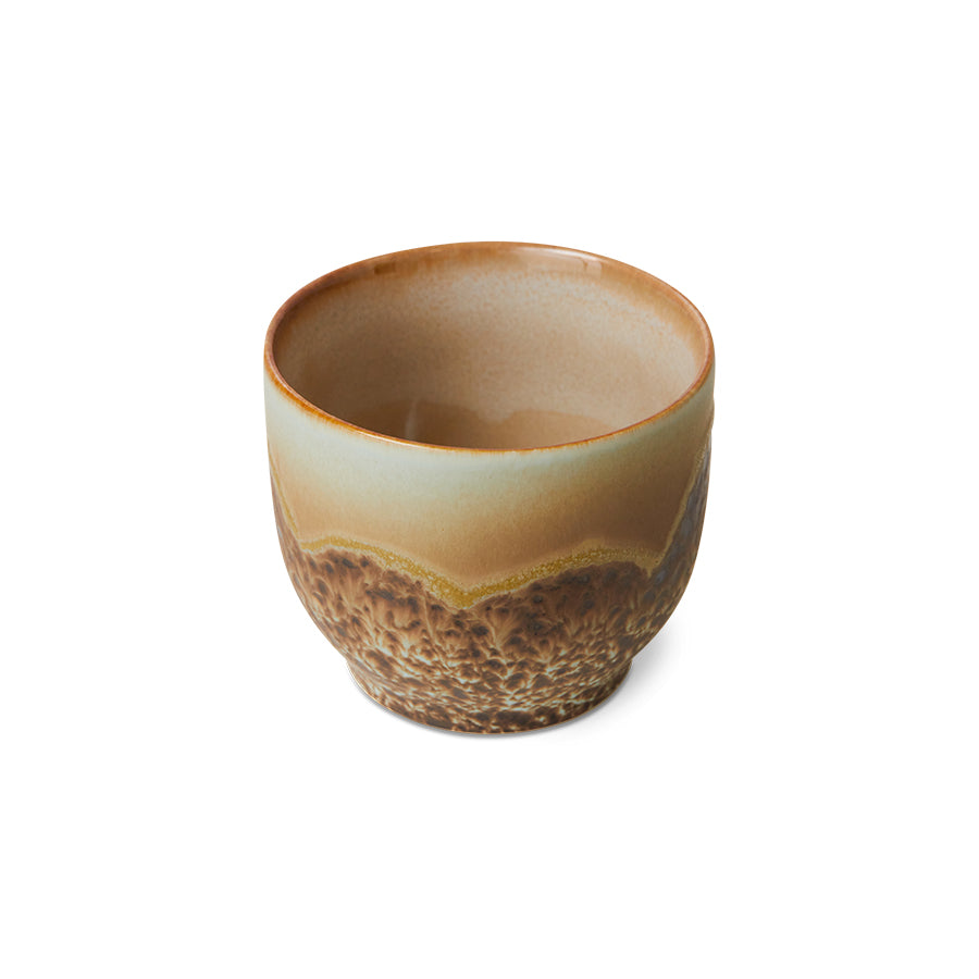 Ceramic cup with a gradient finish on a white background