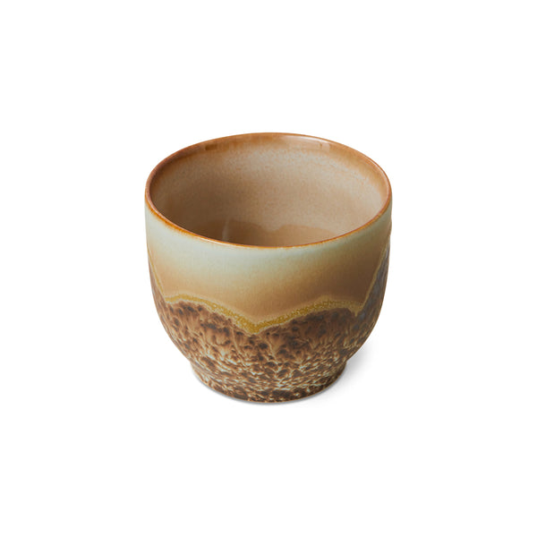 Ceramic cup with a gradient finish on a white background
