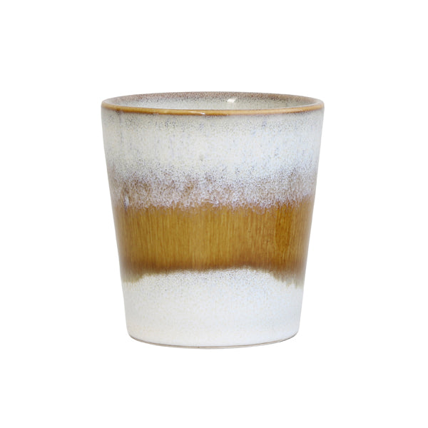 Ceramic mug with two-tone design on a white background