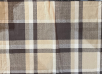 Plaid fabric with brown, beige, and black pattern
