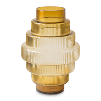 amber colored glass vase with steps