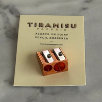 Pencil sharpener on a Tiramisu Papière branded card with a marble background