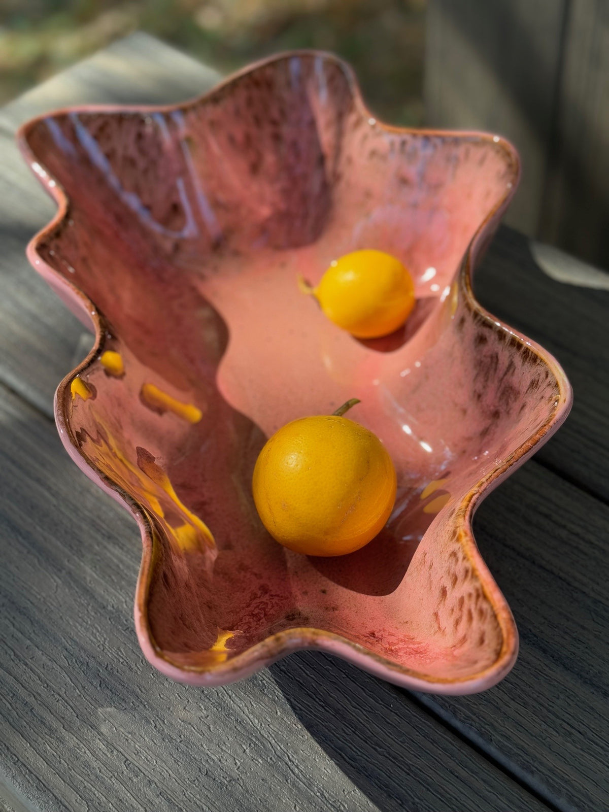 coral shell  shape serving bowl with lemons