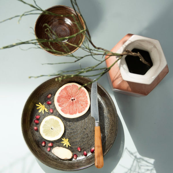 hkliving Kyoto ceramics brown dripping bowl on table with rustic plate with fruit and vase with green leaf branch