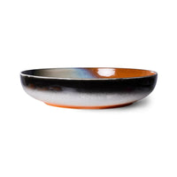 retro style serving bowl in orange black and brown hues