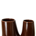 detail of brown colored organic shaped vase sculpture